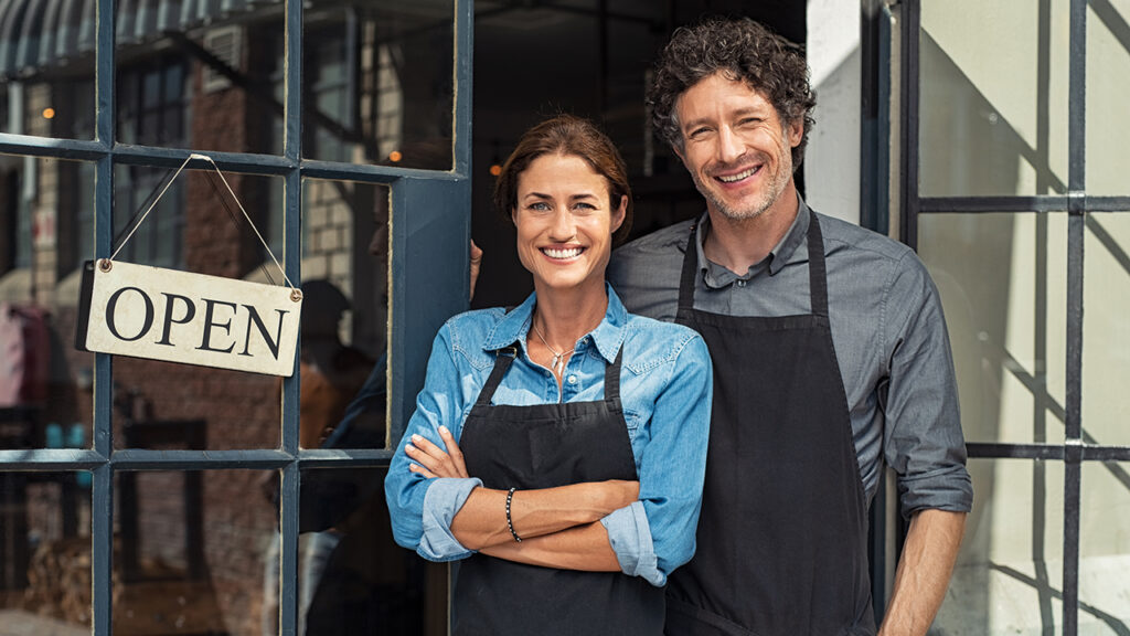 a man and woman standing next to each other